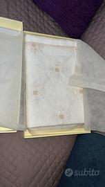 Tende in puro lino ricamate interamente a mano