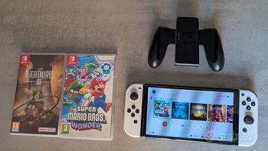 Nintendo Switch + adattatore + giochi 
