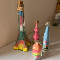 Boccette con sali da bagno e sabbia