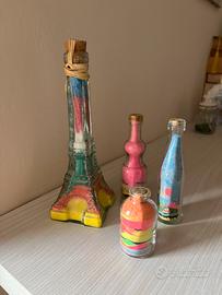 Boccette con sali da bagno e sabbia