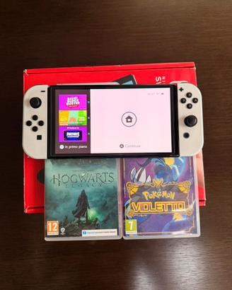 Nintendo switch oled + 2 giochi