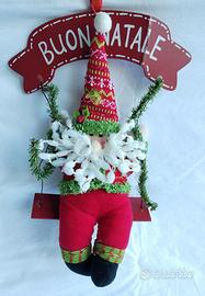 Babbo Natale su altalena