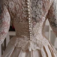 Abito da sposa in mikado di seta e bolero in pizzo