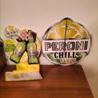 Poggiabottiglia e quadri da collezione Peroni