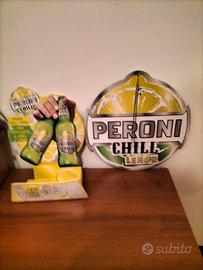 Poggiabottiglia e quadri da collezione Peroni