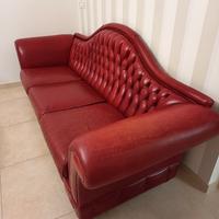 divano in pelle rosso cartier