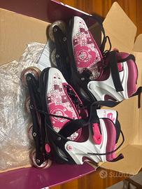 Pattini in linea allungabili 38-41 rosa  AREA