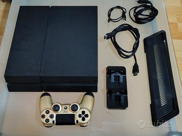 ps4 fat + 6 giochi e accessori  con TV 32" hd