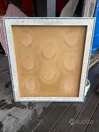 Cornice in travertino e lapislazzuli