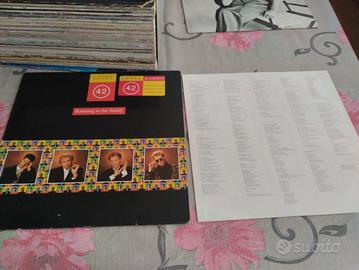 running in the family level 42 vinile live Italy 