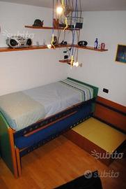 Camera completa con letto a castello scorrevole
