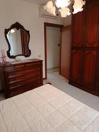 camera matrimoniale in noce classica