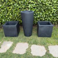 Trittico di vasconi neri in resina