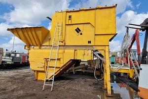 Aprisacco o rompisacco per rifiuti bialbero