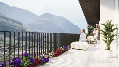 W11: Trilocale con terrazza e mansarda