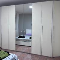 Armadio 8 ante battenti con specchio centrale