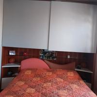 Camera matrimoniale di design in legno – alta qual