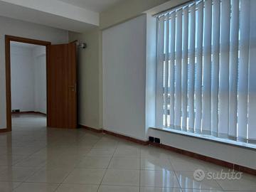 UFFICIO CON POSTO AUTO