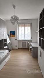 Camera singola in trilocale ristrutturato