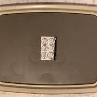 Contenitore  tappetini igienici giovani cagnolini 