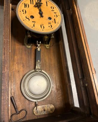 Orologio a pendolo da muro