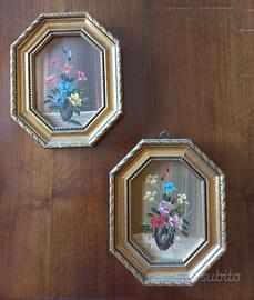 Coppia di quadretti in legno, con motivi floreali