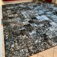 Grande tappeto in pelle con bagni di argento