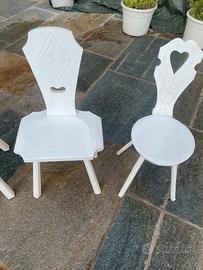 Quattro sedie in legno massello bianche