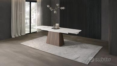 Nuovi tavoli con mono basamento in legno