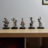 Statuette laminate argento 