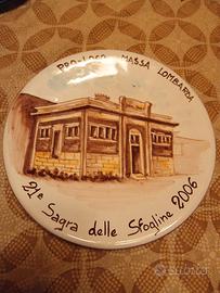 piatti decorativi in ceramica decorati a mano