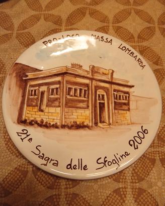 piatti decorativi in ceramica decorati a mano