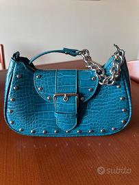 Borsa verdeacqua con borchiette laterali