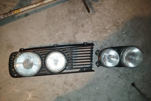 BMW E12, E21, E28, E23, E30, Fari + griglia sx