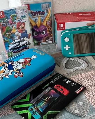 Nintendo Switch Lite Turchese + Giochi e Accessori