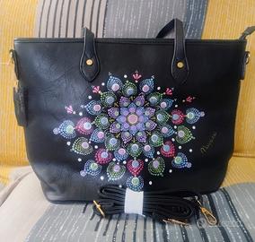 Borsa in pelle decorata a mano