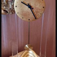 Orologio Dorato e plexiglas