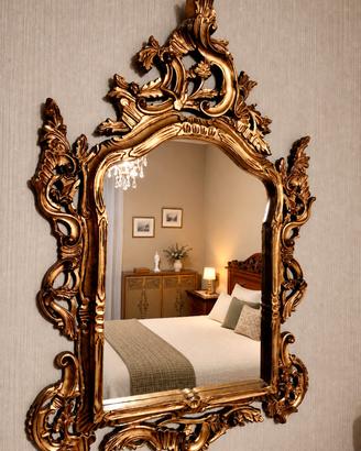 Specchio con cornice dorata intagliata 130 x 86 