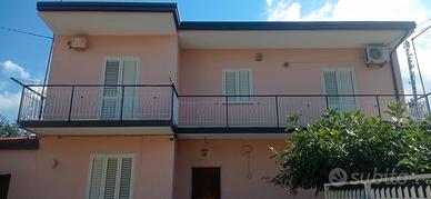 Casa con giardino e terreno