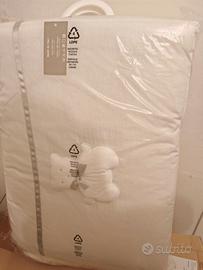 Piumone e paracolpi per culla