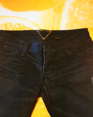 pantaloni a zampa in velluto rigato 