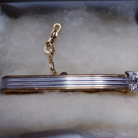 Fermacravatta argento placcato oro e pietre Swarov