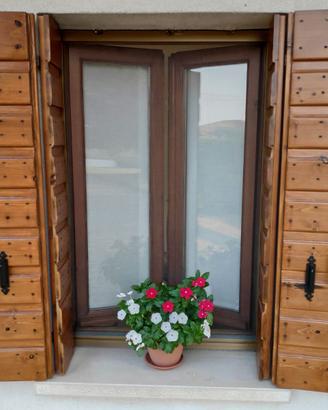 Finestre e scuri alla padovana in legno massello