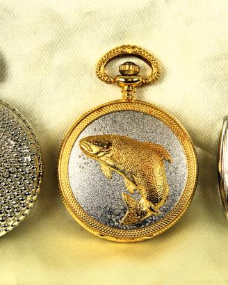 3 orologi da tasca.