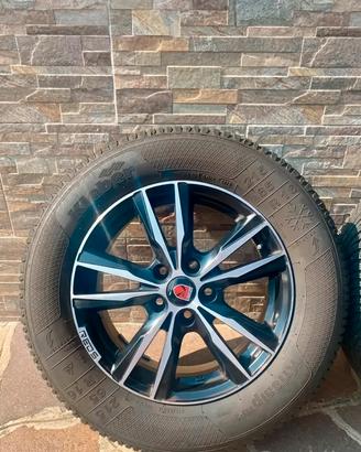 Cerchi in lega Momo Designed + gomme invernali