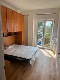 Stanza singola con letto matrimoniale