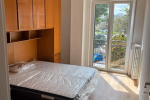 Stanza singola con letto matrimoniale