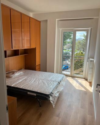 Stanza singola con letto matrimoniale