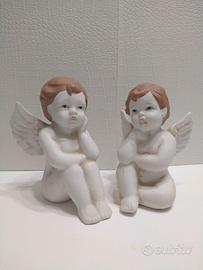 2 angeli seduti vintage in ceramica