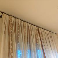 Bastoni con anelli per tende